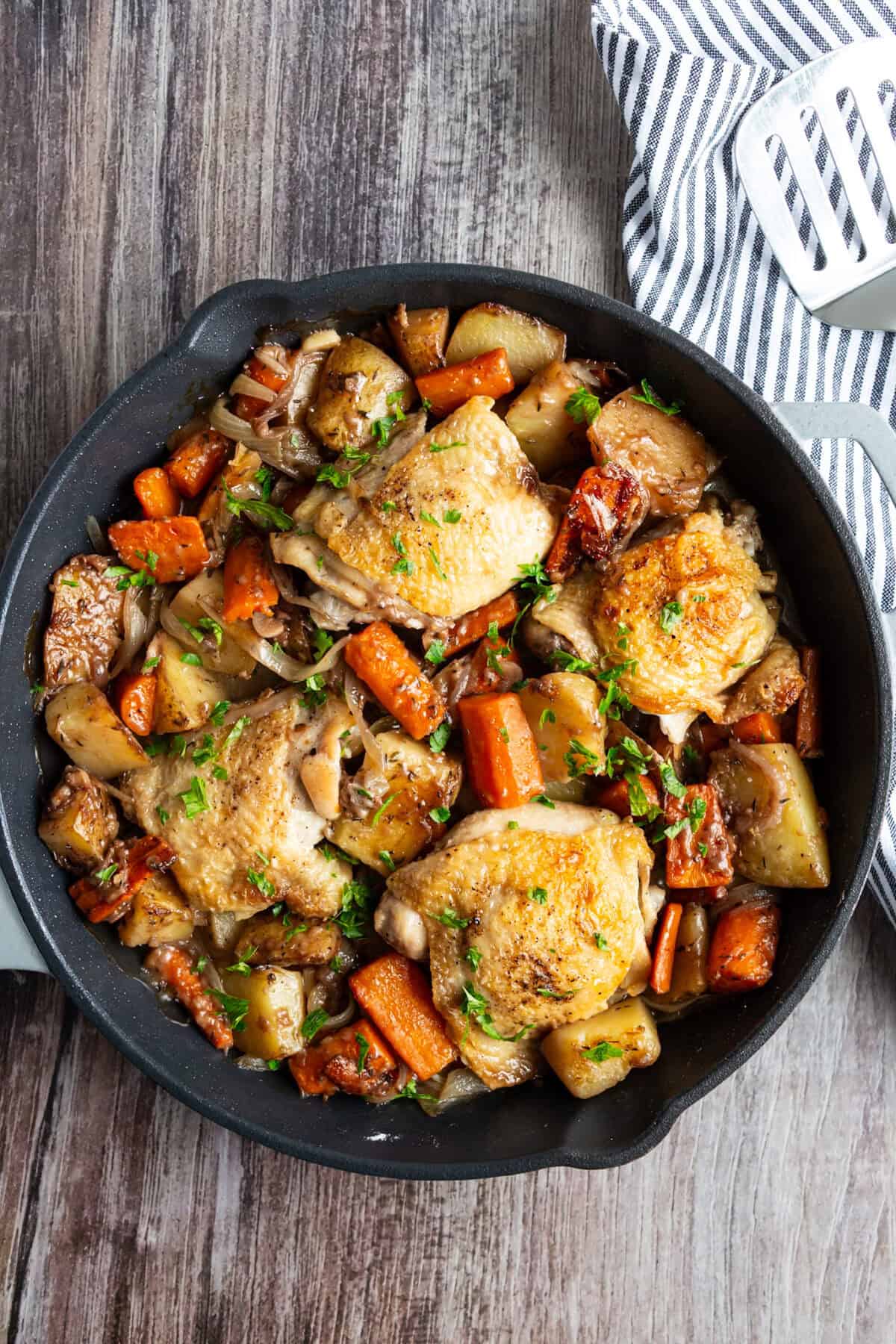A pan of braised chicken thighs.