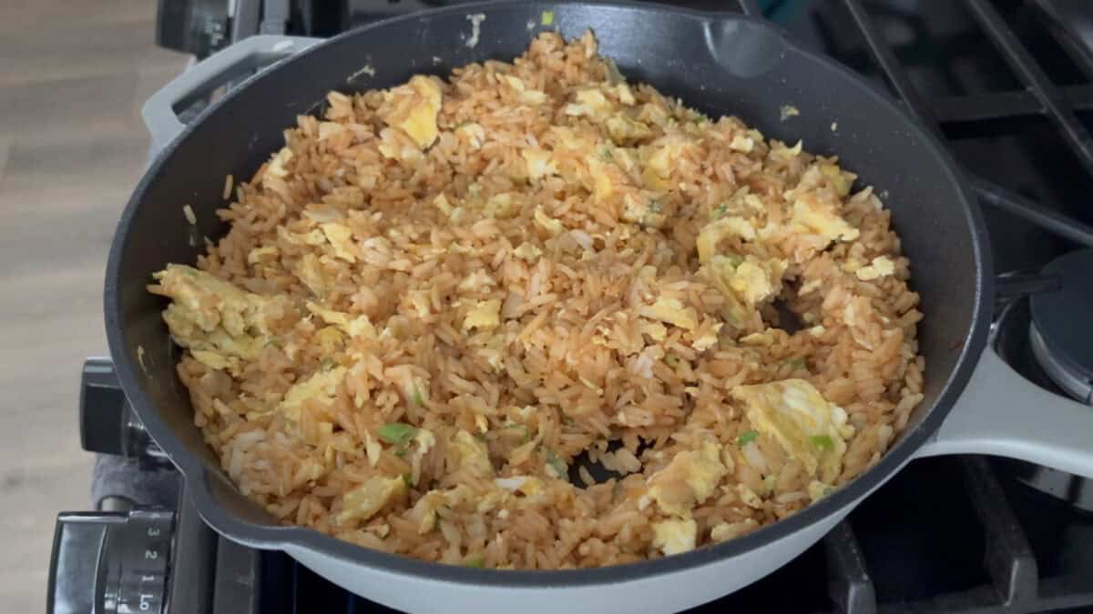 A pan of egg fried rice.