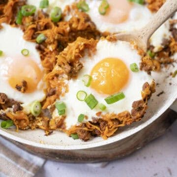 Baked eggs with chorizo and shredded sweet potato.