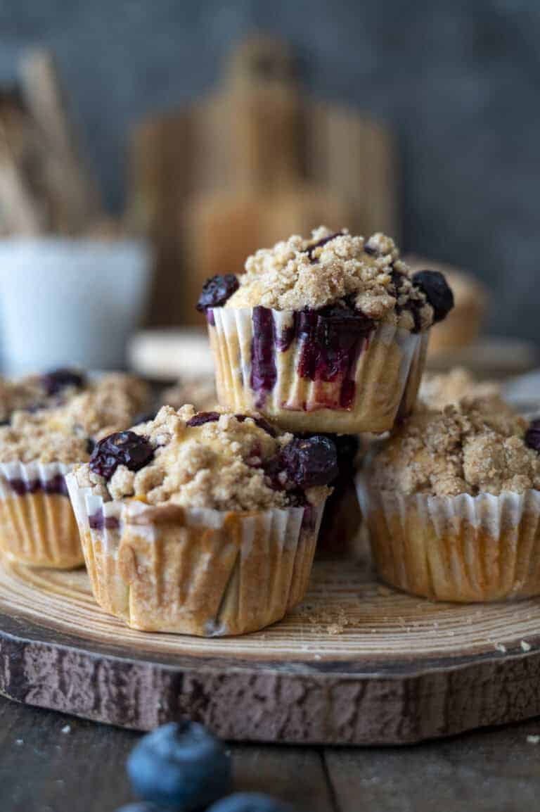 A tray of blueberry buttermilk muffins with streusel topping.
