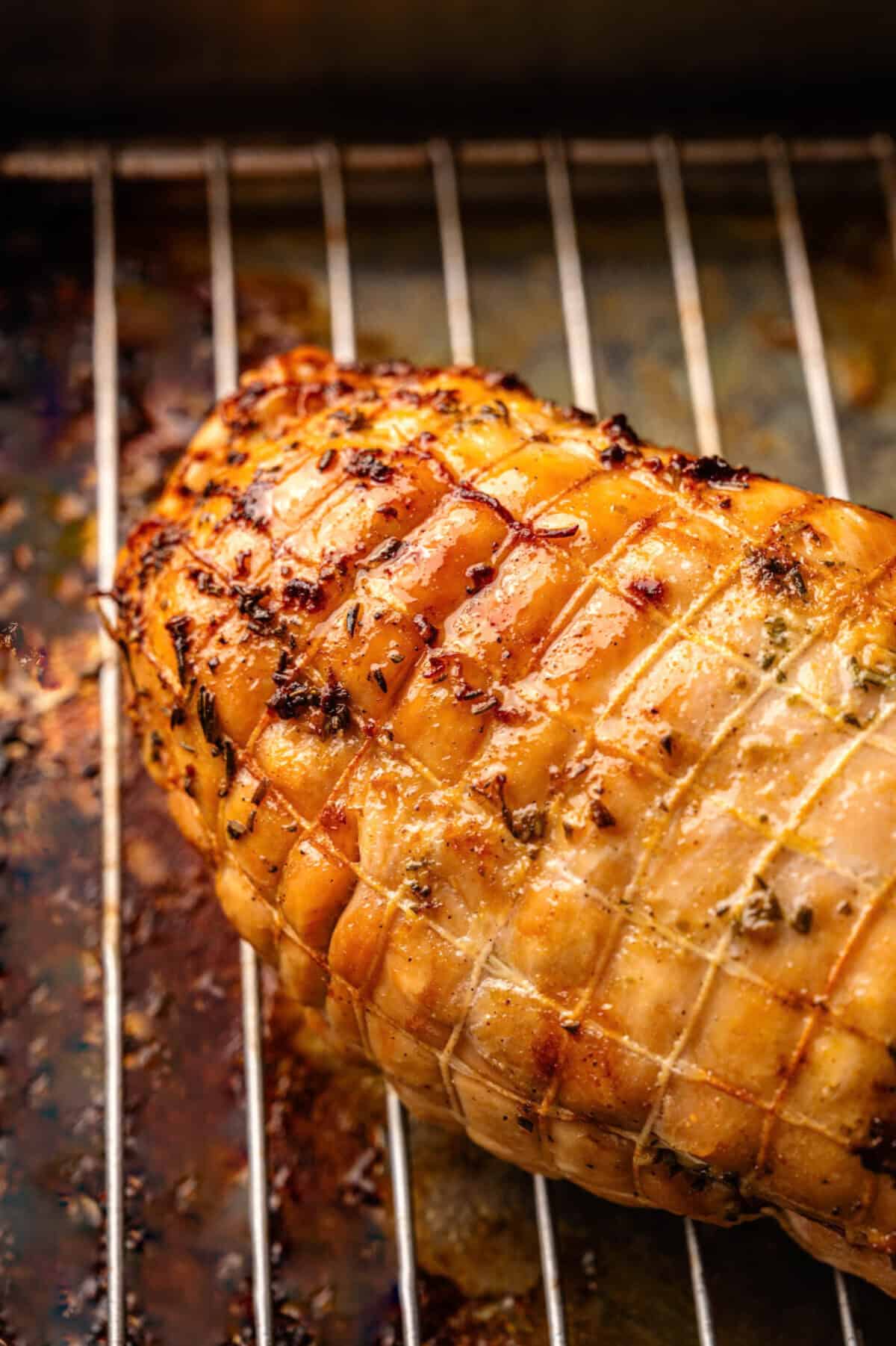 A roasted turkey breast broiled on top.