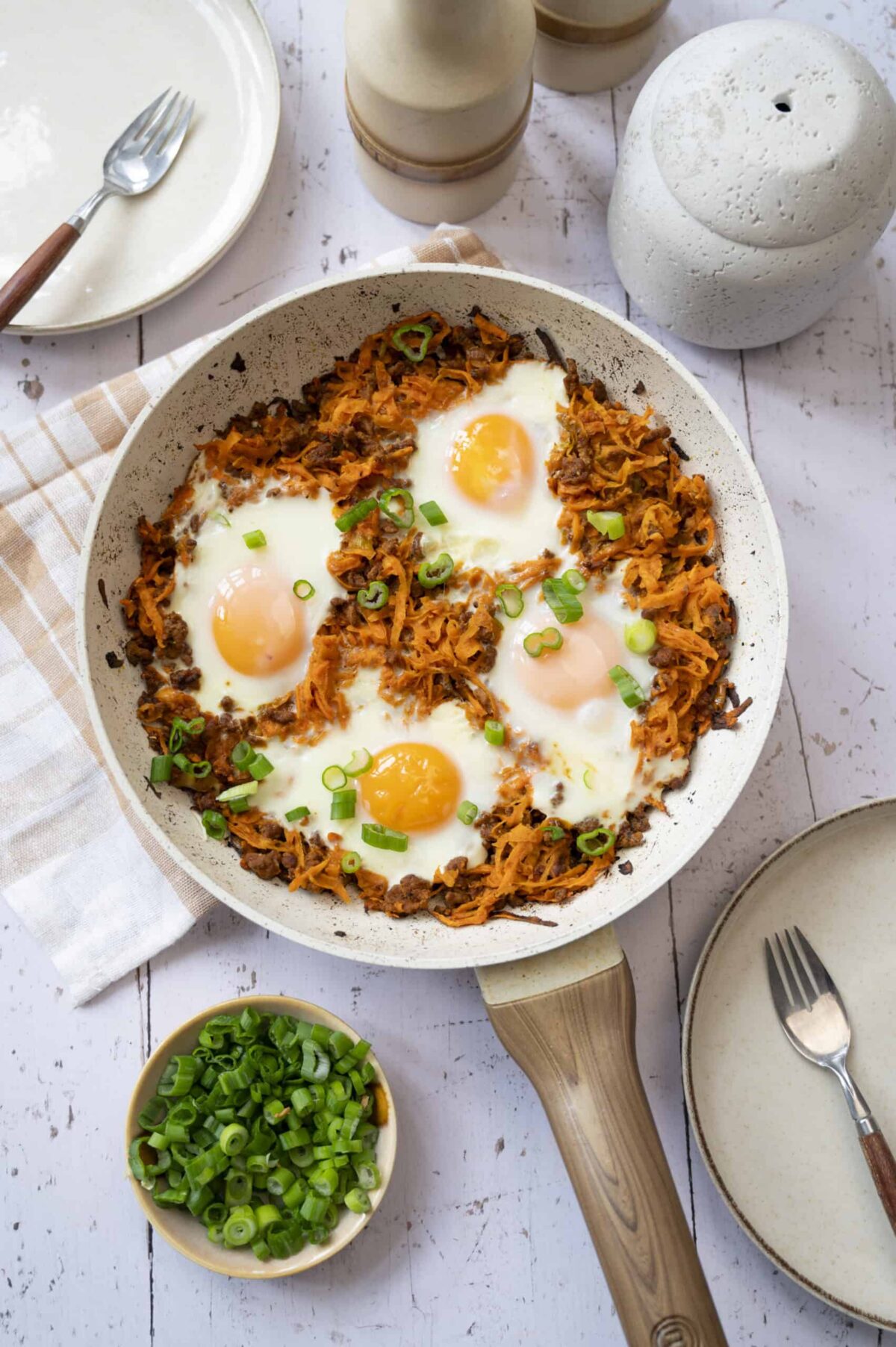 Baked eggs with sweet potato and chorizo.