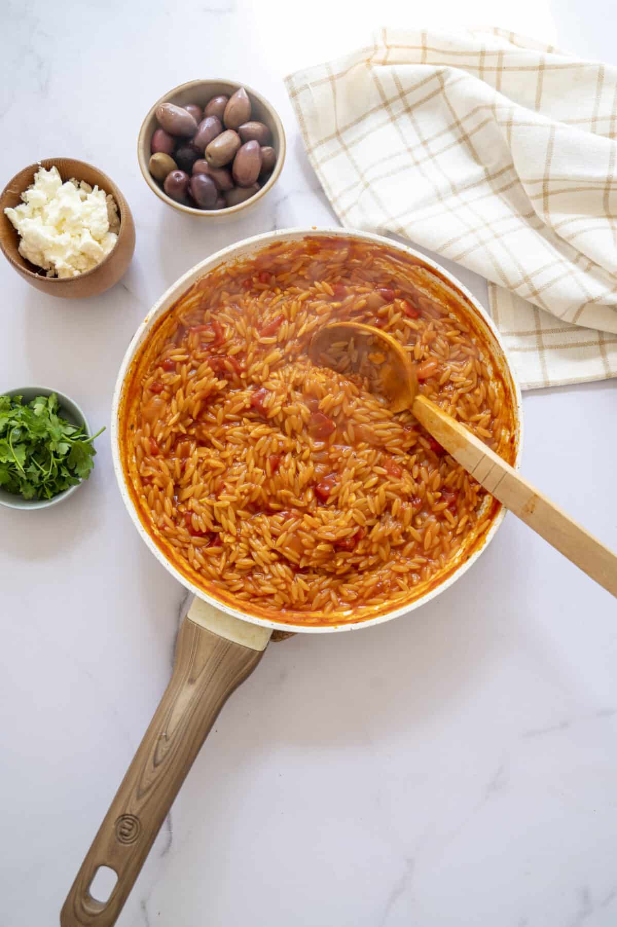 A pan of cooked orzo.