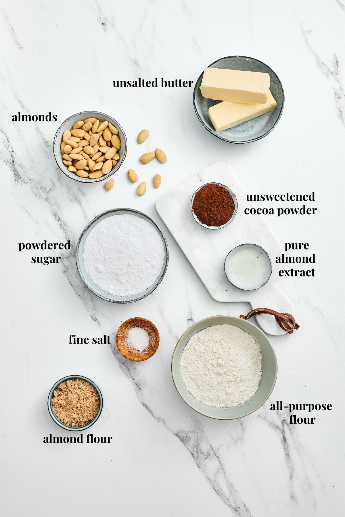 Ingredient images for almond cocoa powder cookies.