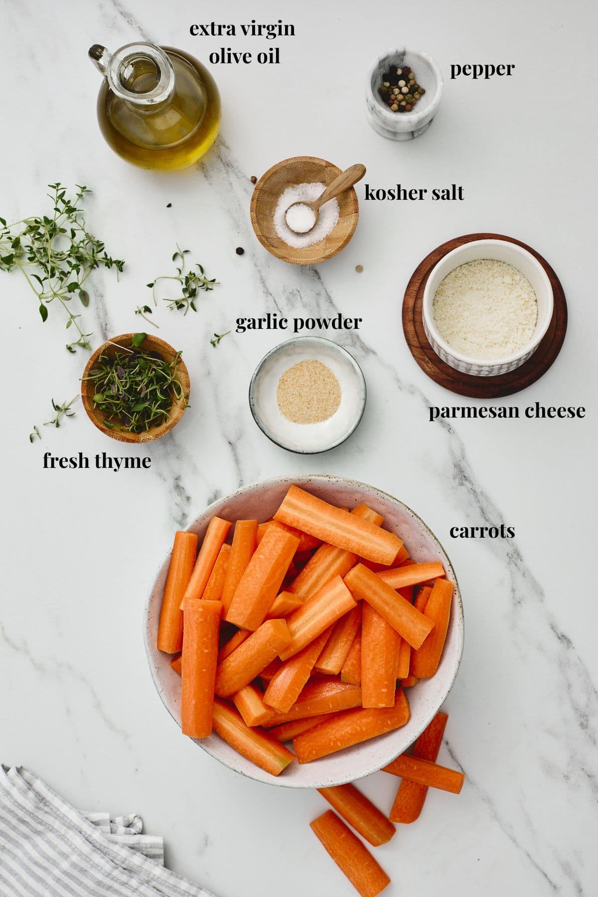 Ingredient images for roasted parmesan carrots with thyme.