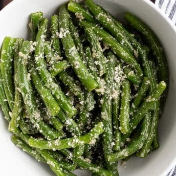 A bowl of seasoned green beans.