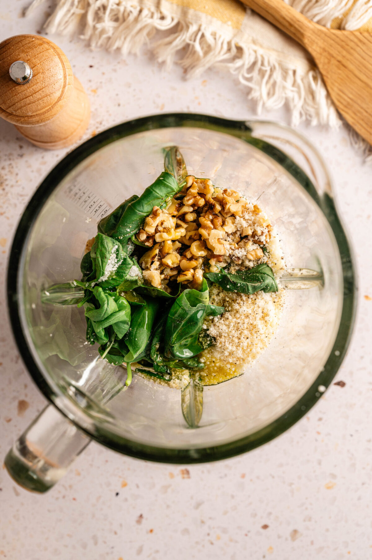 Ingredients to make basil pesto.