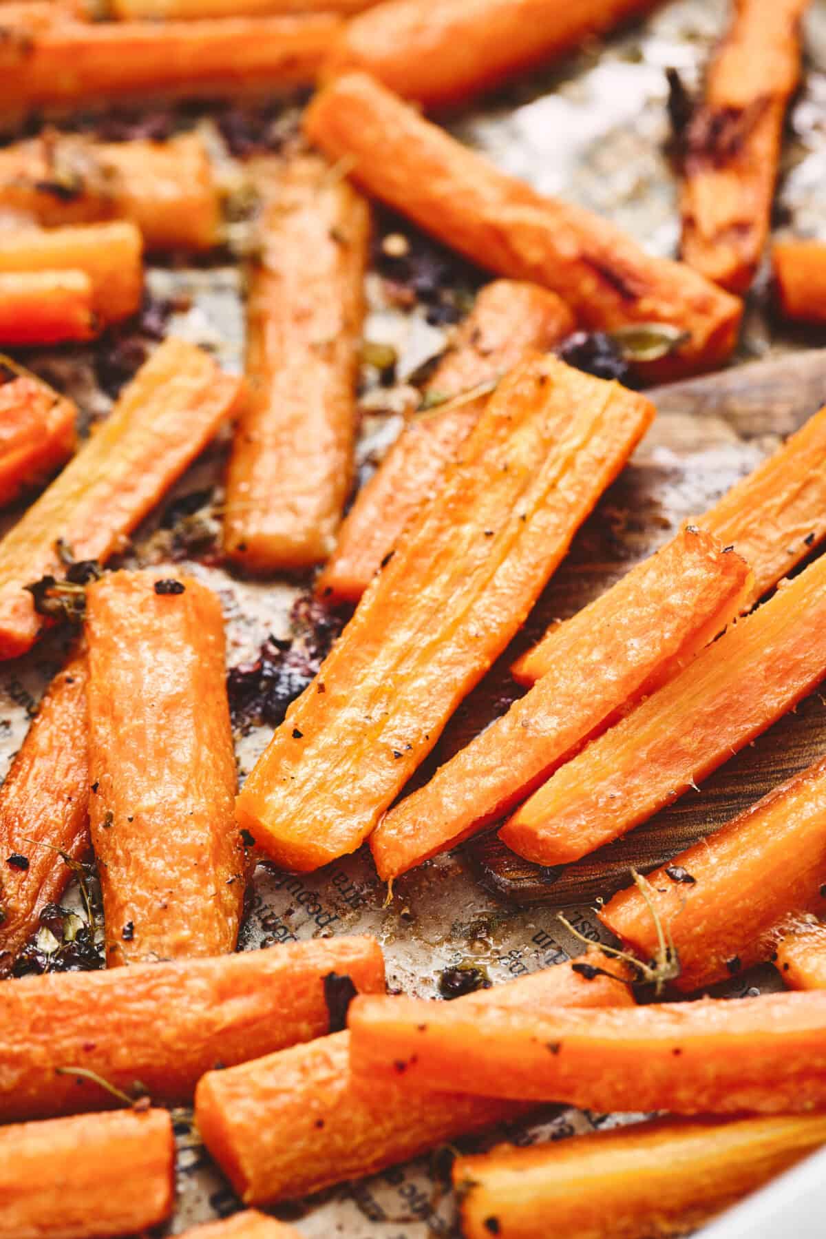 A pan of caramelized roasted carrots.