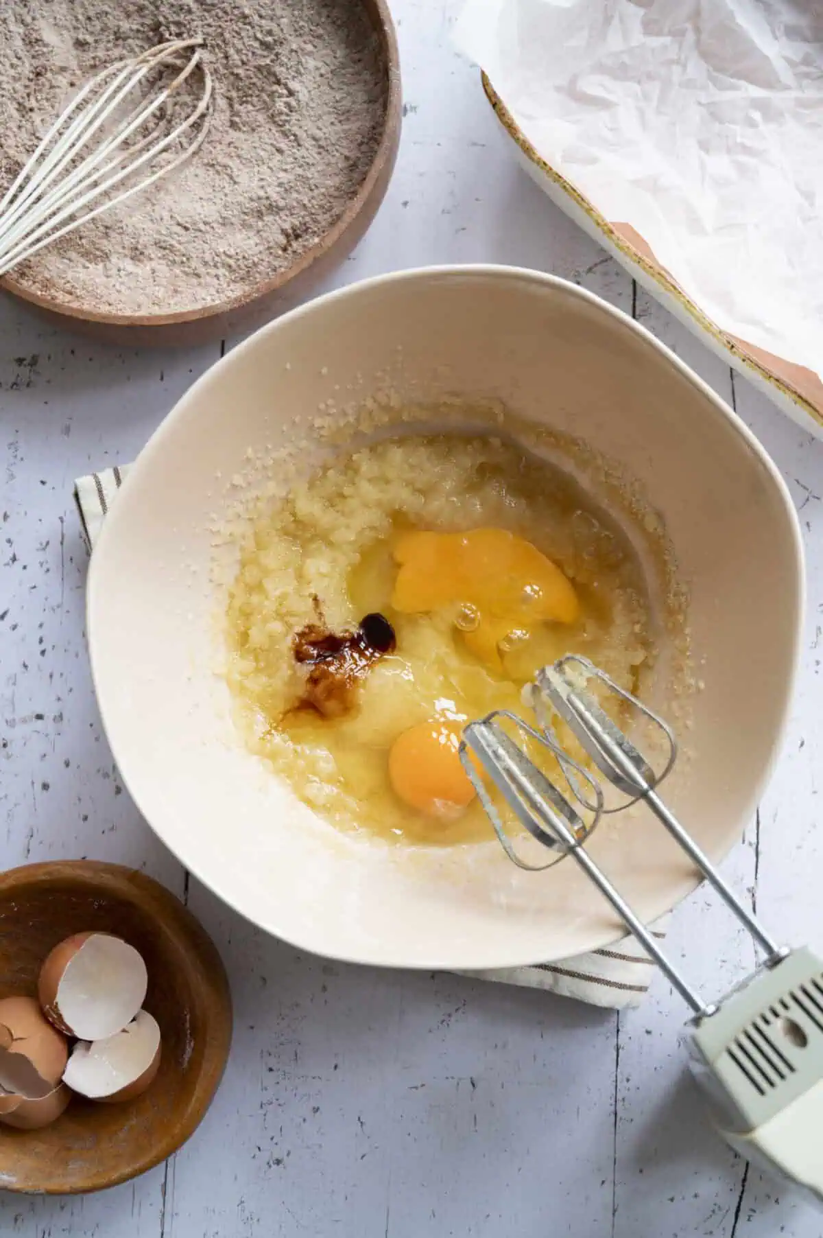Mixed sugar, butter, and oil.