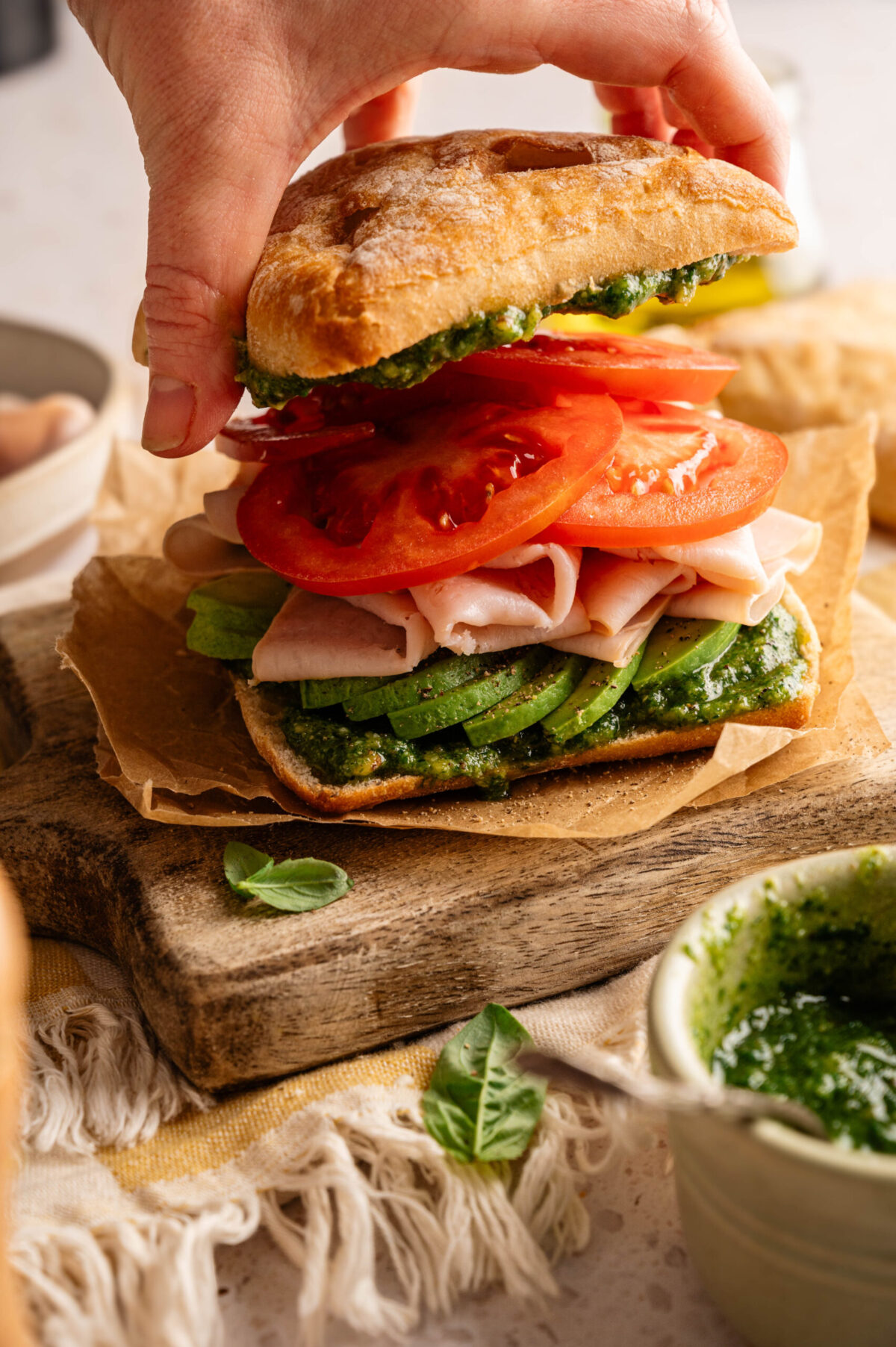 An assembled smoked turkey sandwich.