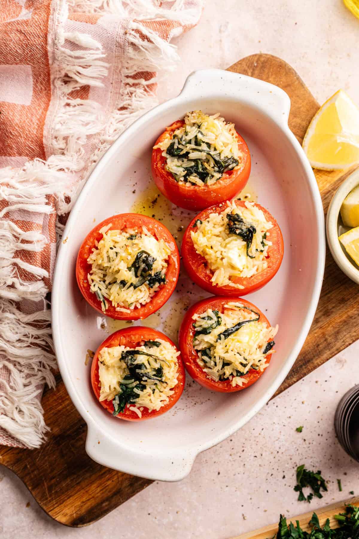 Cooked tomatoes stuffed with rice.
