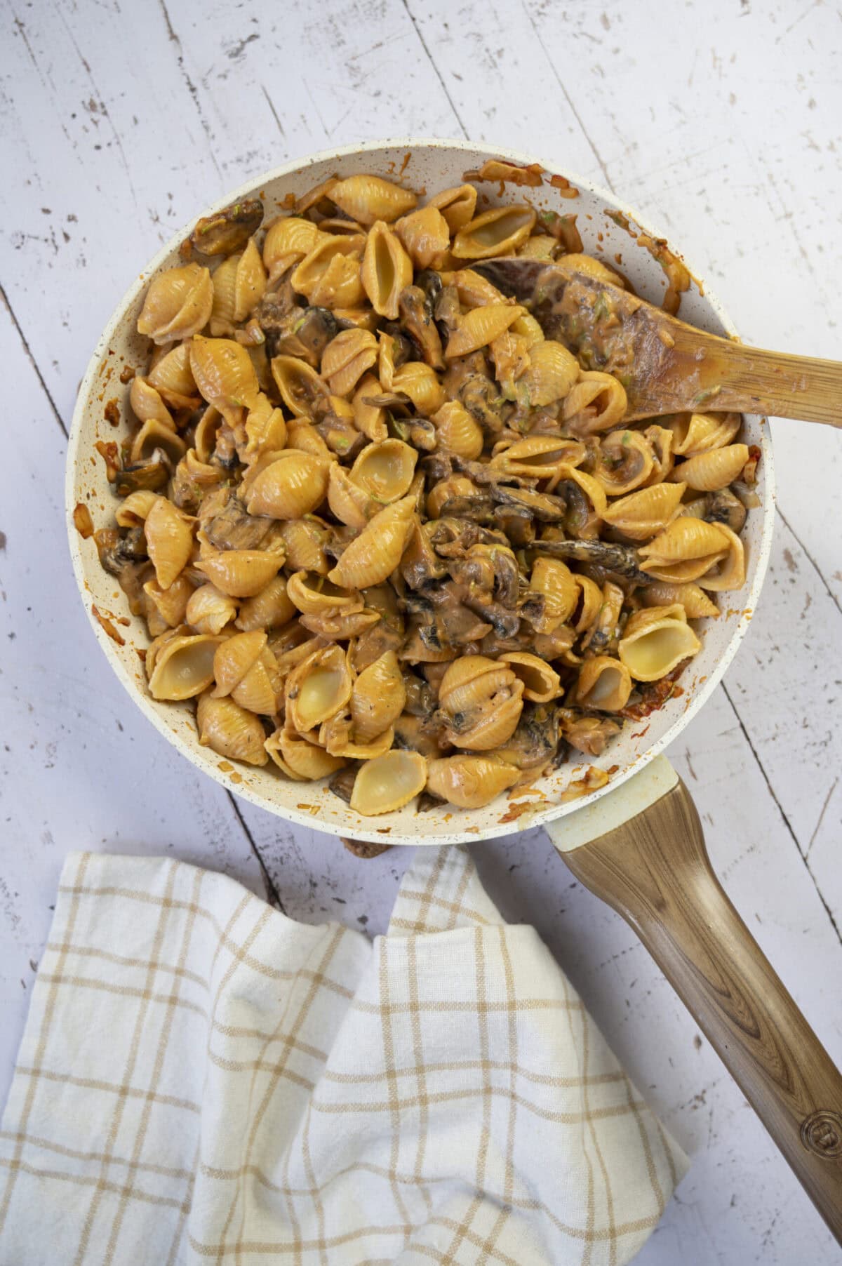 Pasta shells tossed with mushrooms and heavy cream.