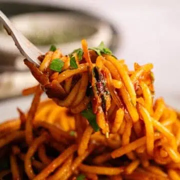 A forkful of caramelized shallot pasta.