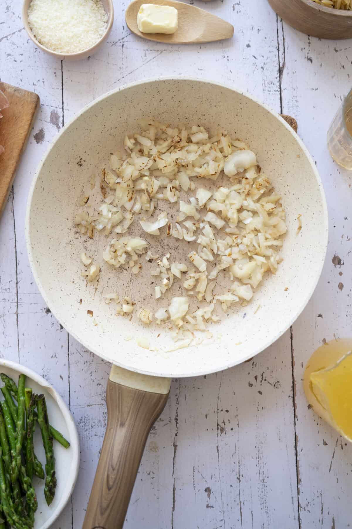 A pan of sauteed garlic and shallots.