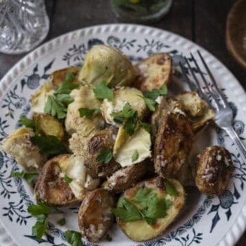 Baked baby potatoes and artichoke hearts.