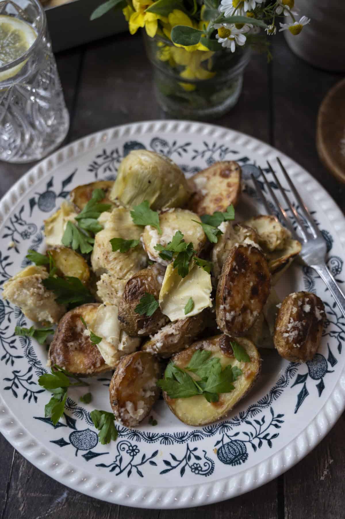 Baked baby potatoes and artichoke hearts.