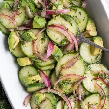 A crisp cucumber salad with dill and avocado.