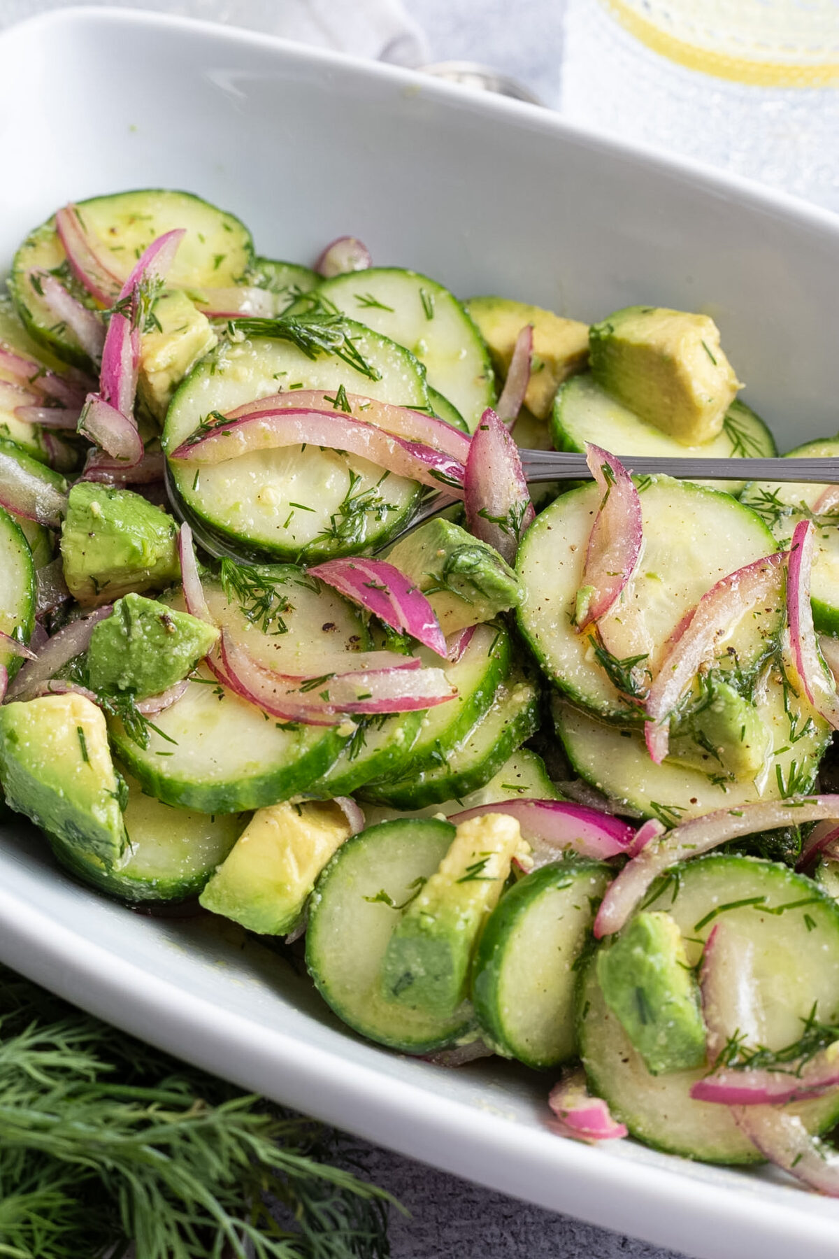 Cucumber salad with dill and avocado.