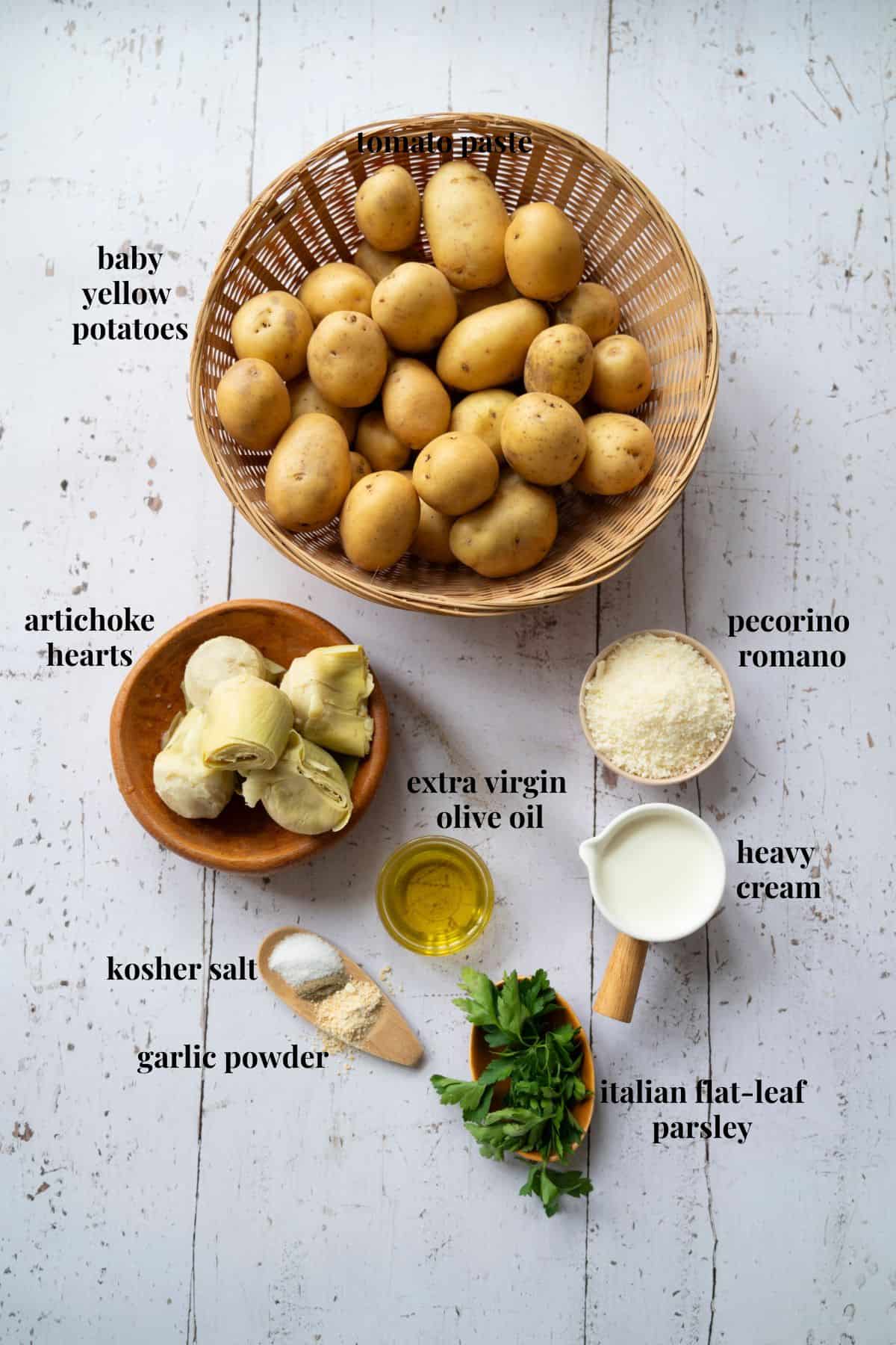 Ingredient images for creamy baked artichoke hearts and potatoes.
