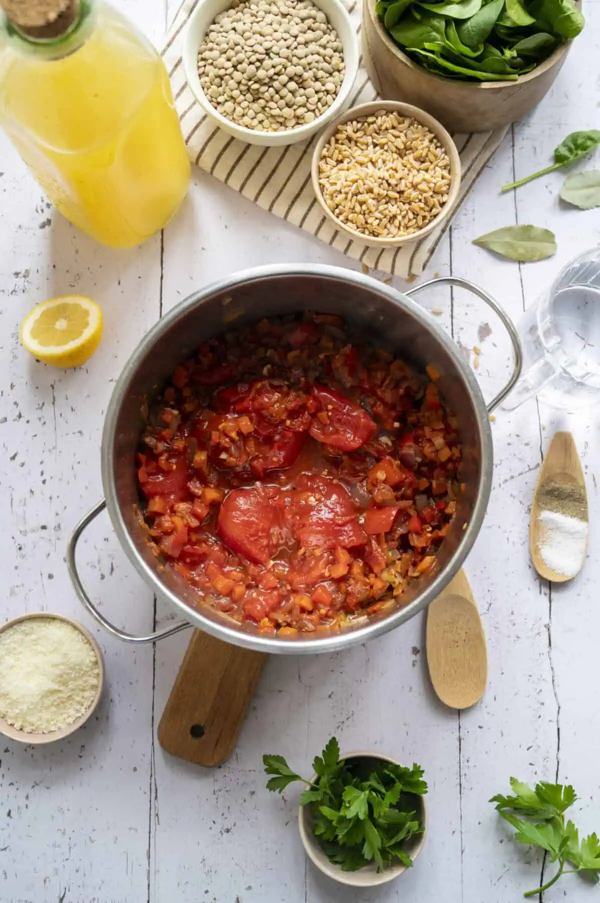A pot of soup with fire-roasted tomatoes.