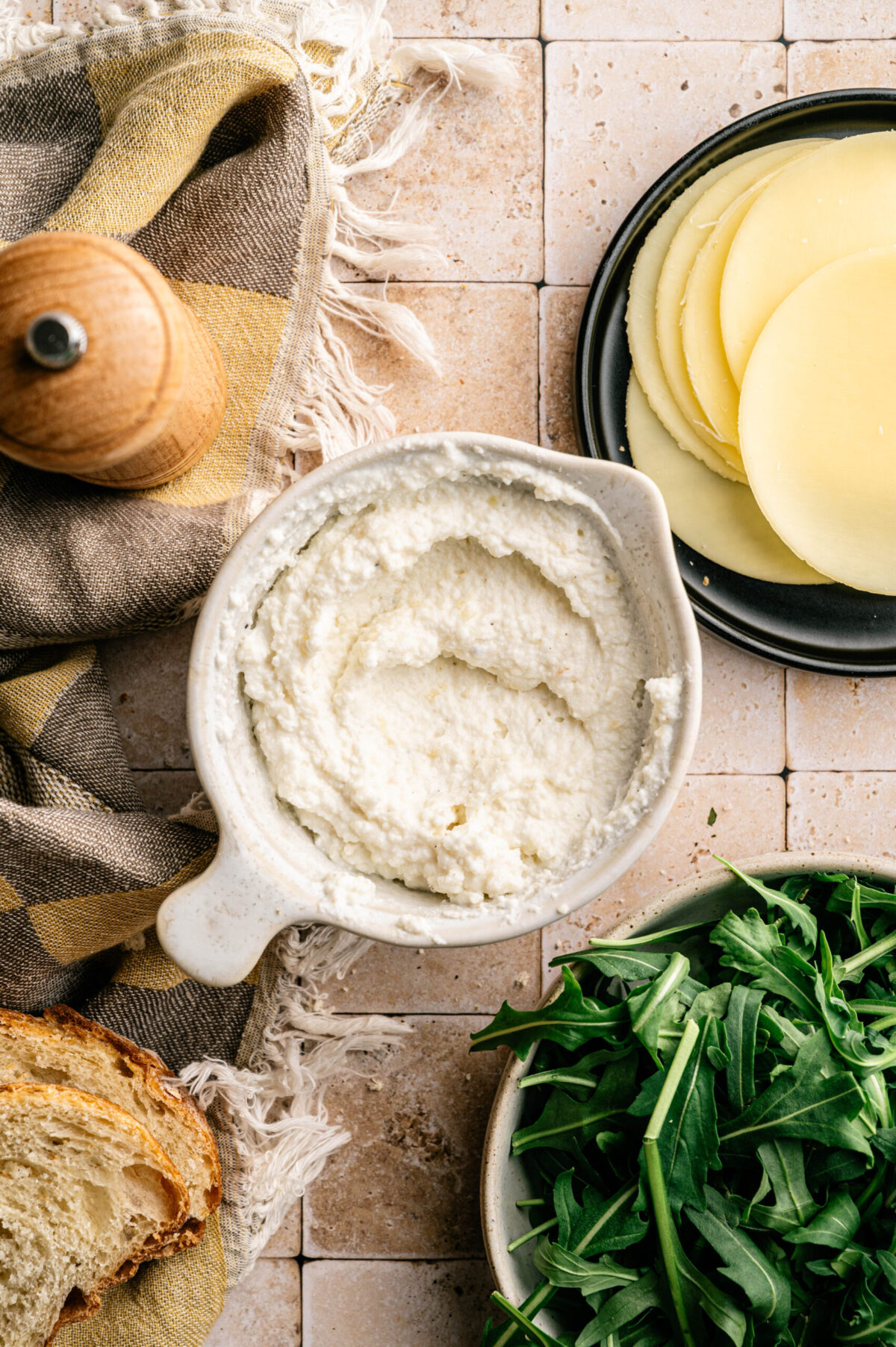 A bowl of whipped ricotta.