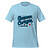 Light blue Guanaco de Corazón graphic T-shirt for fans of the design.