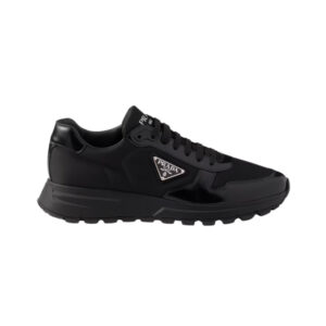 Black Alexander McQueen Sprint Runner sneaker with Prada logo detail.