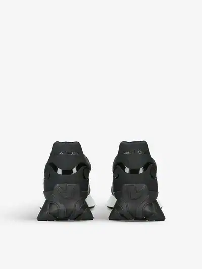 Black Alexander McQueen Sprint Runner sneakers for men.