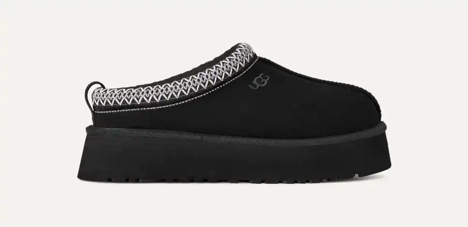 Tazz Black slip-on sneakers with comfortable design and stylish look.