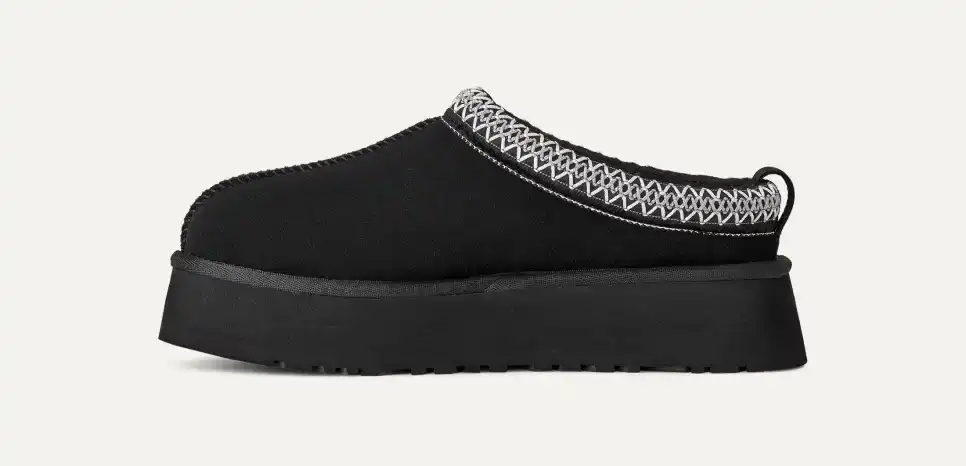 Tazz Black slip-on sneakers with comfortable design and stylish look.