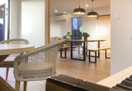 Warm, inviting family home interior with modern dining and living spaces, natural light, and stylish decor.