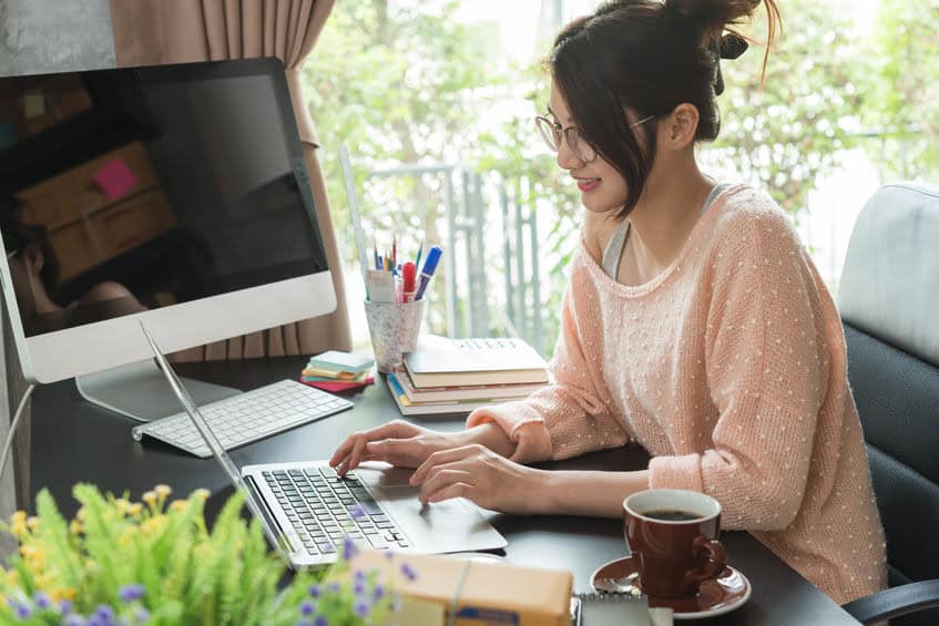 woman working from garage suite at home