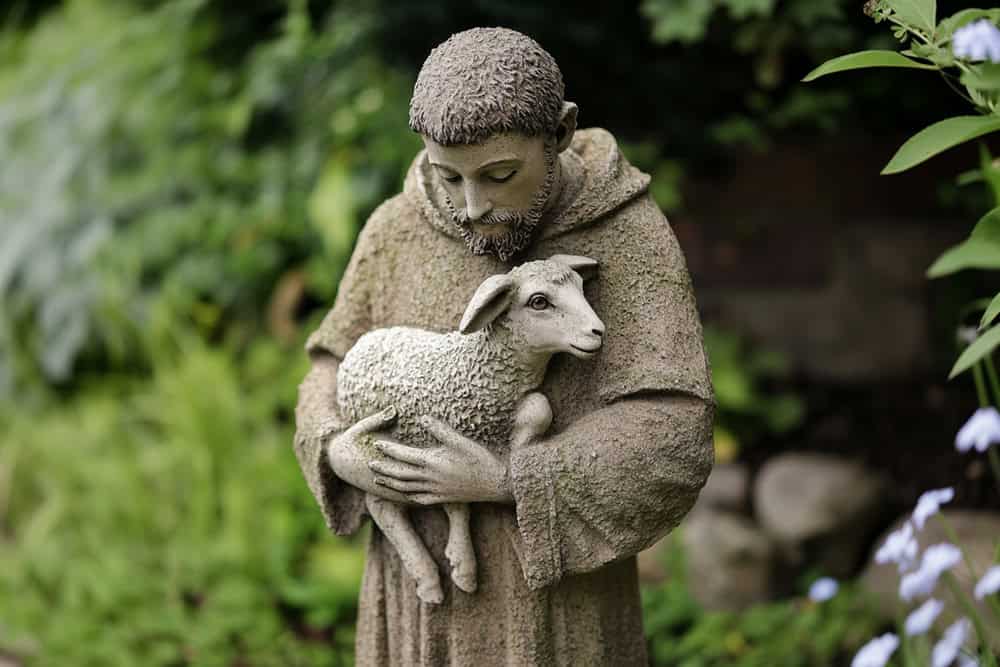 St.. Francis holding a lamb garden statue
