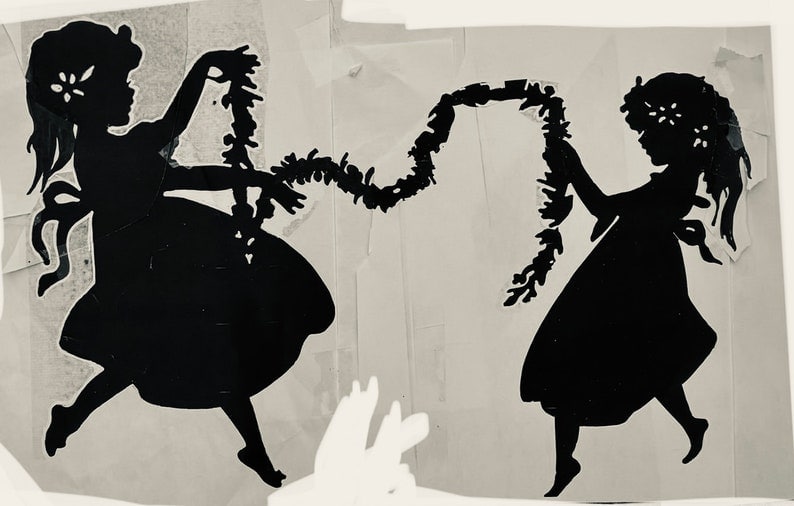 sisters_dancing_sculpture silhouette sculpture of two sisters dancing