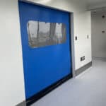Porta in tessuto ad alta velocità con bordo inferiore flessibile per interni