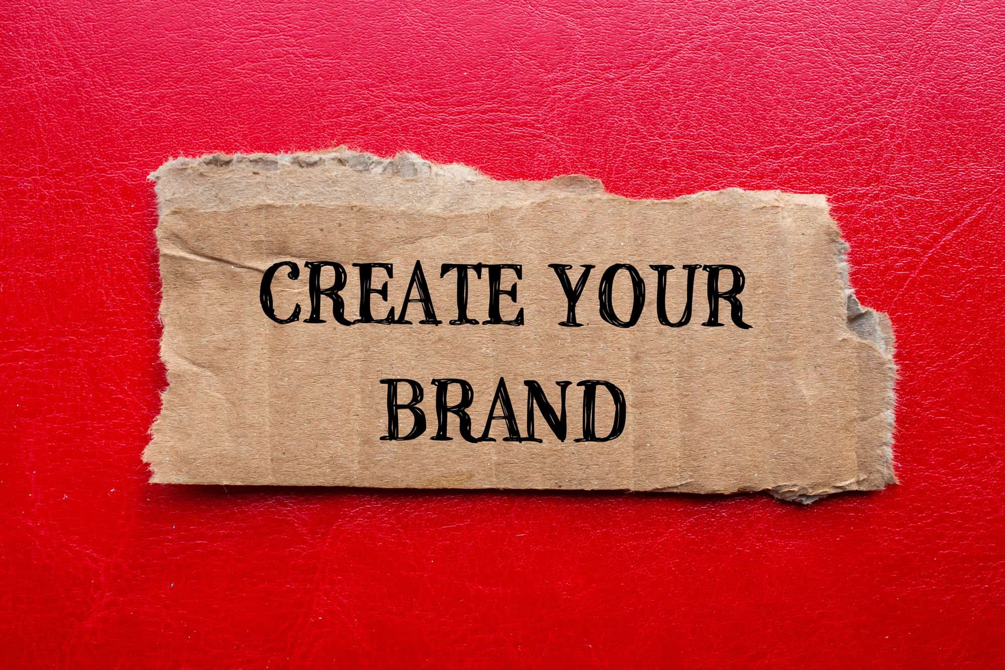 Personal brands 2 A scrap piece of cardboard with the words create your brands written on