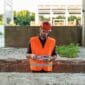 builder looking documents construction site min 85x85