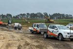 Excavation site with construction vehicles and equipment in progress in New Zealand.