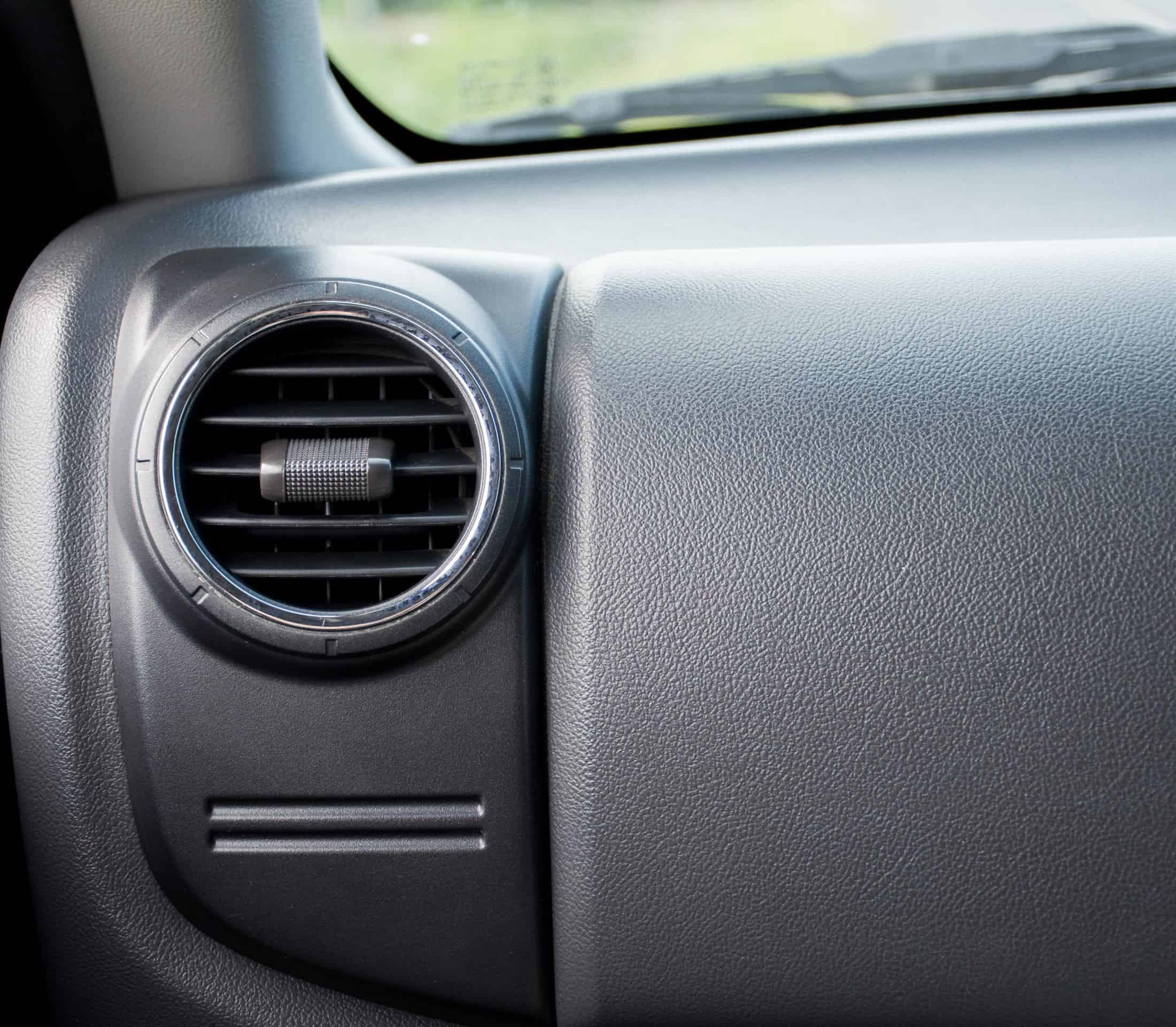 Flexible car air vent in vehicle dashboard, automotive interior feature, vehicle ventilation system.