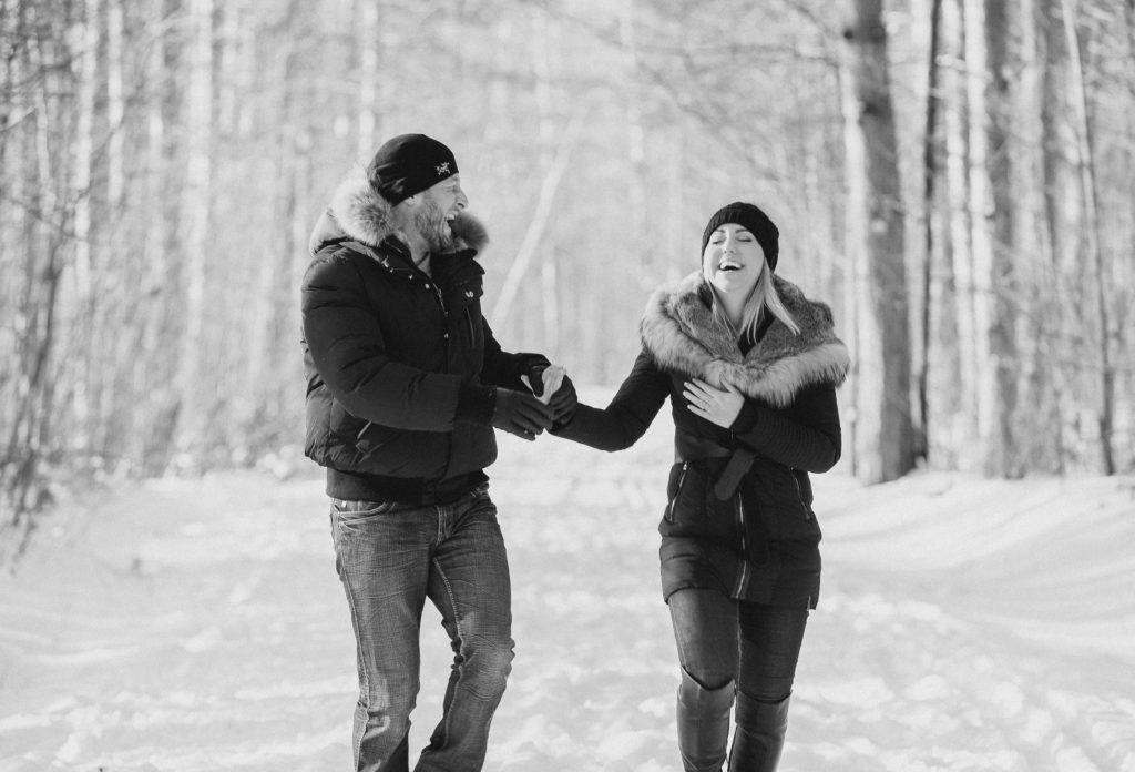 pine grove trail Winter Engagement Session grey loft studio ottawa wedding photographer videographer engagement kanata orleans nepean beautiful locations for engagement photos in ottawa black coats and tan coloured accents with jeans