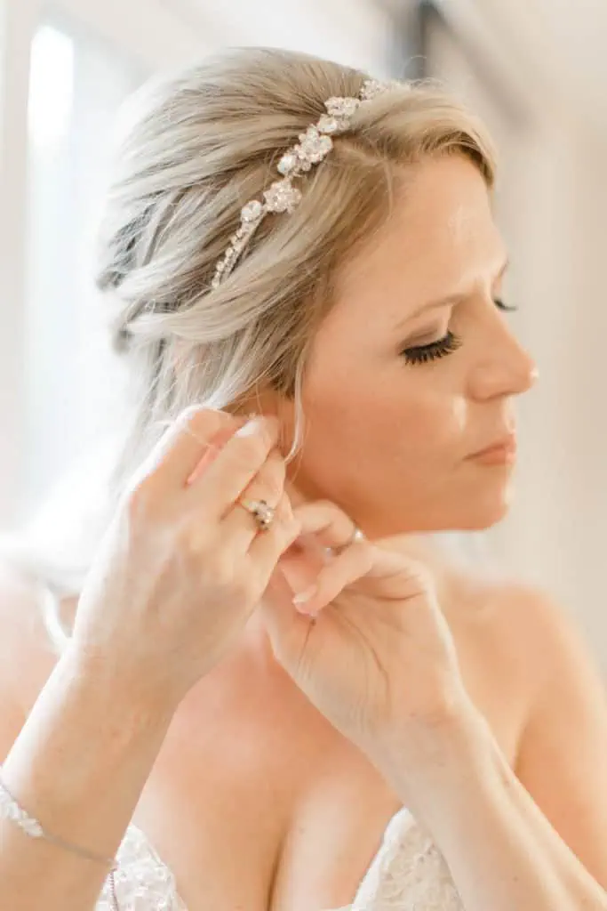 Bride getting Ready Photos -Bride putting on Earrings- Makeup Artist - Romantic Wedding at NeXt in Stittsville - Grey Loft Studio - Ottawa Wedding Photographer - Ottawa Wedding Photo & Video Team
