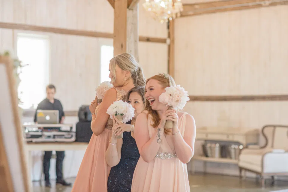 Fun Bridal Party Entrance Photos - Fun shots with Bridesmaids - Rose Gold Sequinned Dresses -  Stonefields Estate-  Bright and Airy - Natural Wedding Posing - Modern Wedding Blush &. Navy Wardrobe inspiration-  Romantic white with greenery, blush and navy theme. Grey Loft Studio is Stonefields Wedding and Engagement Photographer for Real couples, showcasing photos that are modern, bright, and fun.