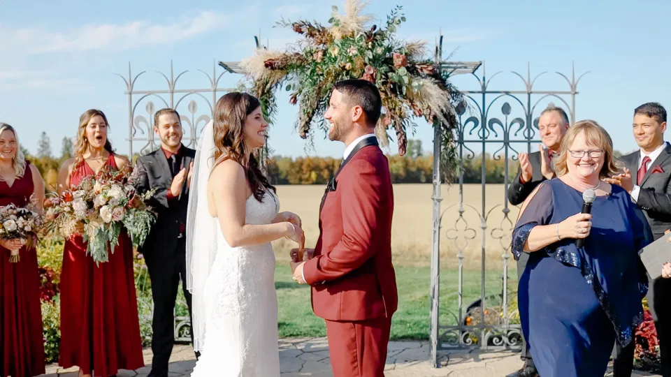 Bride and Groom standing at the Ceremony Site - Evermore Wedding and Events - Blue Sky, Fall Wedding. Grey Loft Studio Photography & Videography Ottawa