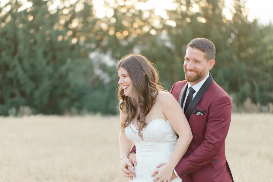 Fun Natural Wedding Poses - Holding Hands - Bride and Groom Posing at Sunset - Evermore Wedding and Events, Almonte - Bright, Modern, and Fun Wedding Photography. Grey Loft Studio . Wedding Photographer Ottawa. 