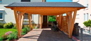 Huge wooden carport in the sun.