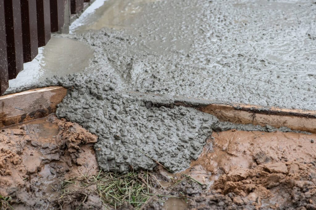 Concrete grounding system installation for electrical safety and compliance.