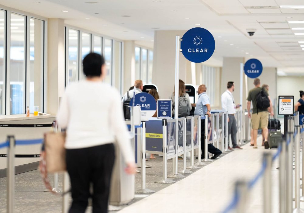 CLEAR enrollment center with travelers and employees at GSP