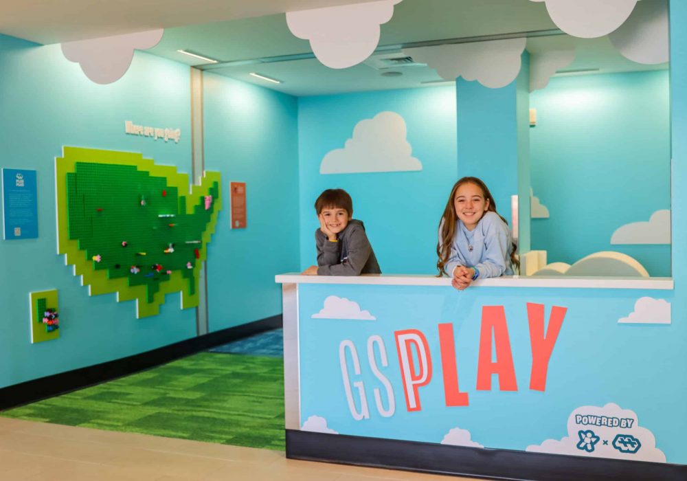 Two kids playing in the GSPlay area