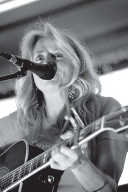 Carter sings as part of this year’s Singer/Songwriter Concert. 