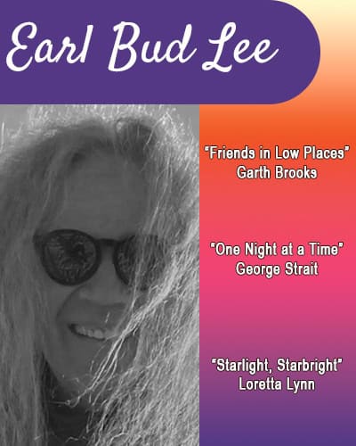 Earl Bud Lee in a closeup wearing sunglasses with his hair blowing across his face and a big smile.